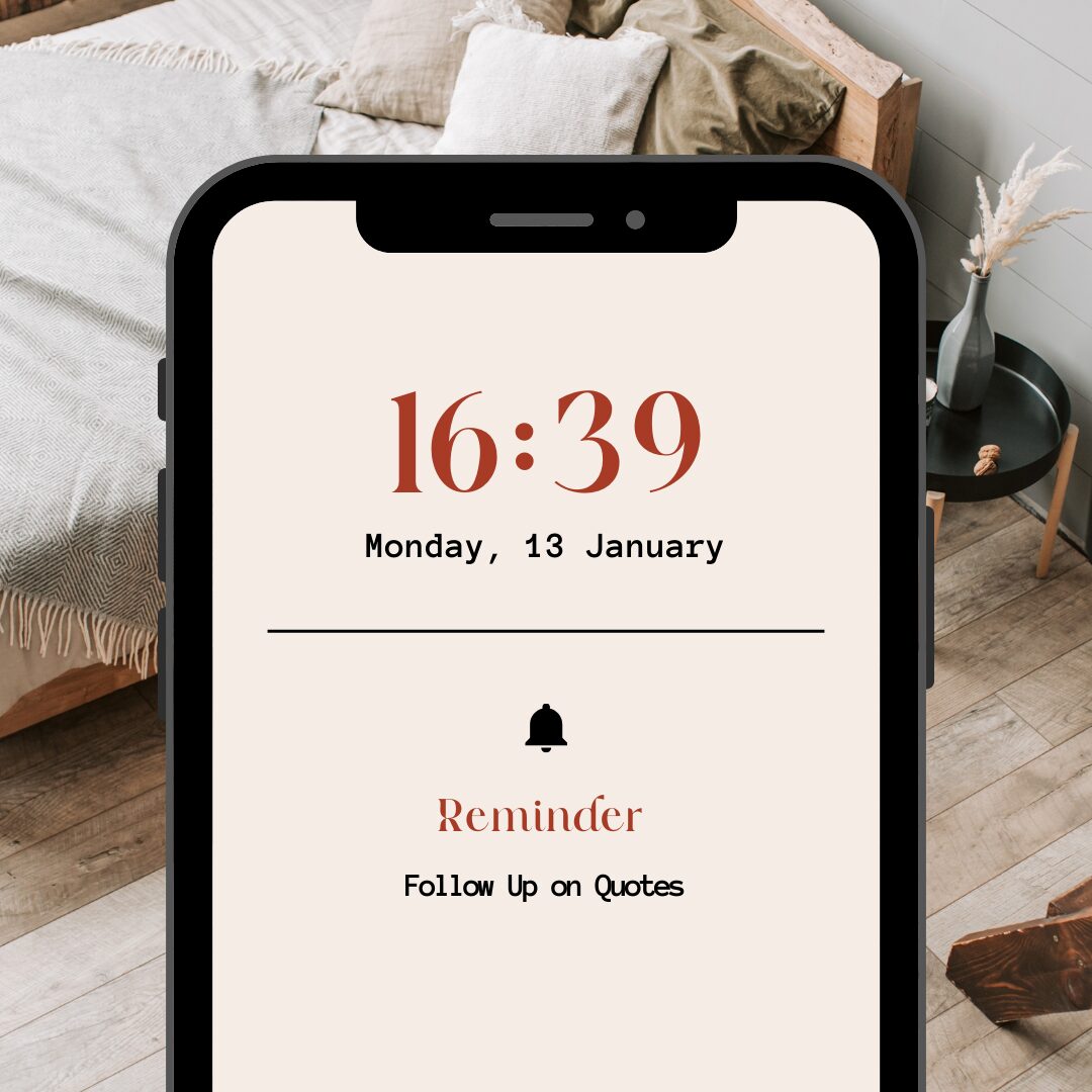A smartphone displaying a reminder to follow up on quotes, time 16:39, on a wooden bedside table.